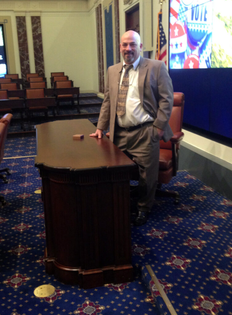 douglas p dimes with his recreation of the us senate president's desk